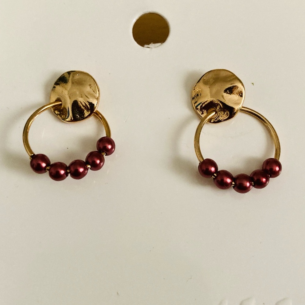 Pretty small gold hoop earrings with burgundy details